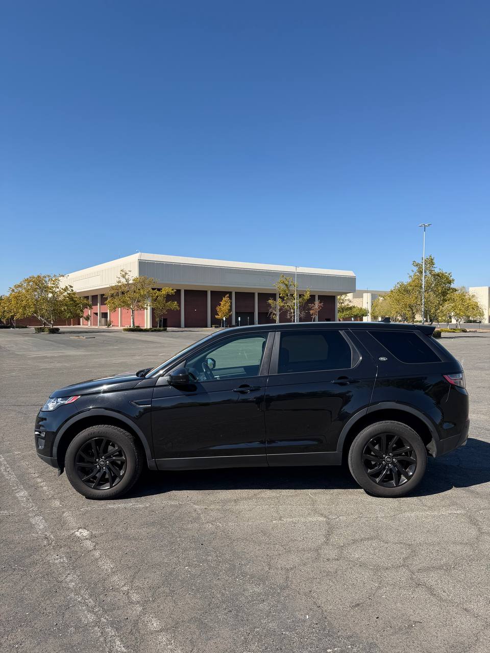 Black Land Rover viewed from the side